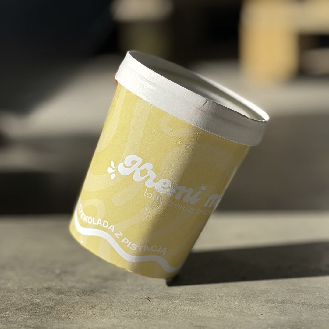 Lody o smaku Białej Czekolady z Polewą Pistacjową